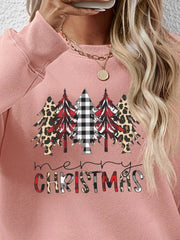 Blush pink crewneck sweatshirt with Christmas trees in buffalo plaid, leopard print, and red plaid.