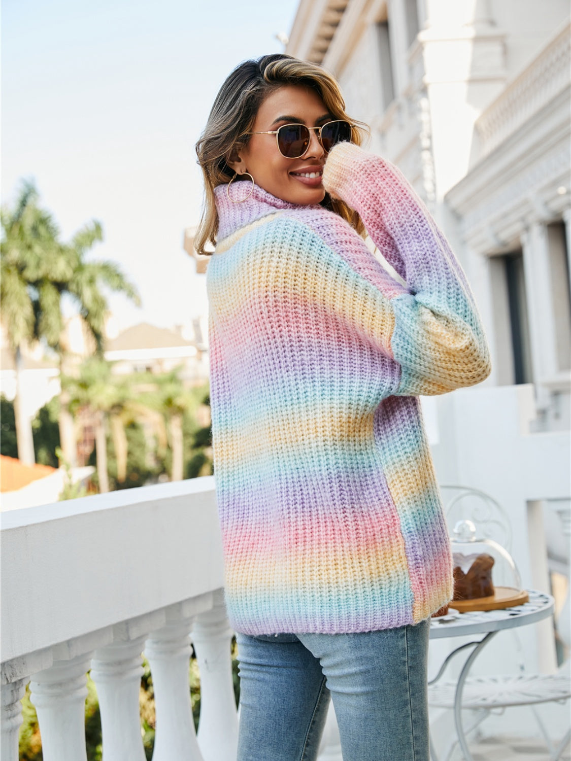Chunky knit turtleneck sweater in rainbow gradient blush pink acrylic blend.