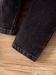 Children's dark wash denim jeans with orange stitching detail.