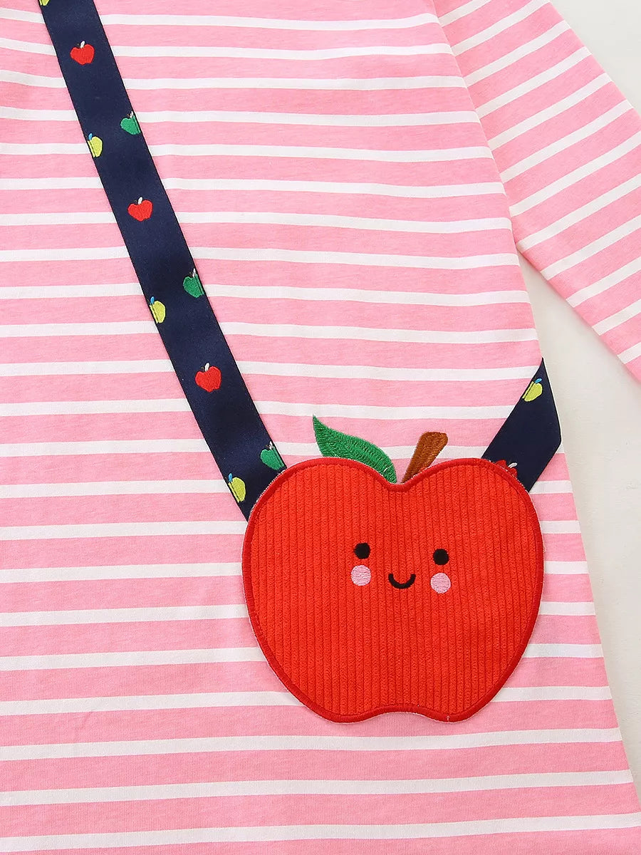 Baby girl's pink striped cotton dress with a red apple applique and apple print navy strap.