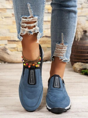 Blue suede-like round toe slip-on sneakers with "OUTDOOR" detail.