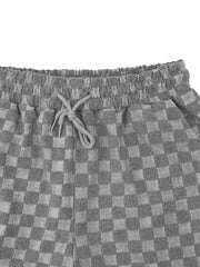 Dark gray checkered casual shorts for men with drawstring waist.