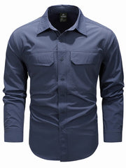 French blue cotton overshirt with buttoned flap pockets and collar
