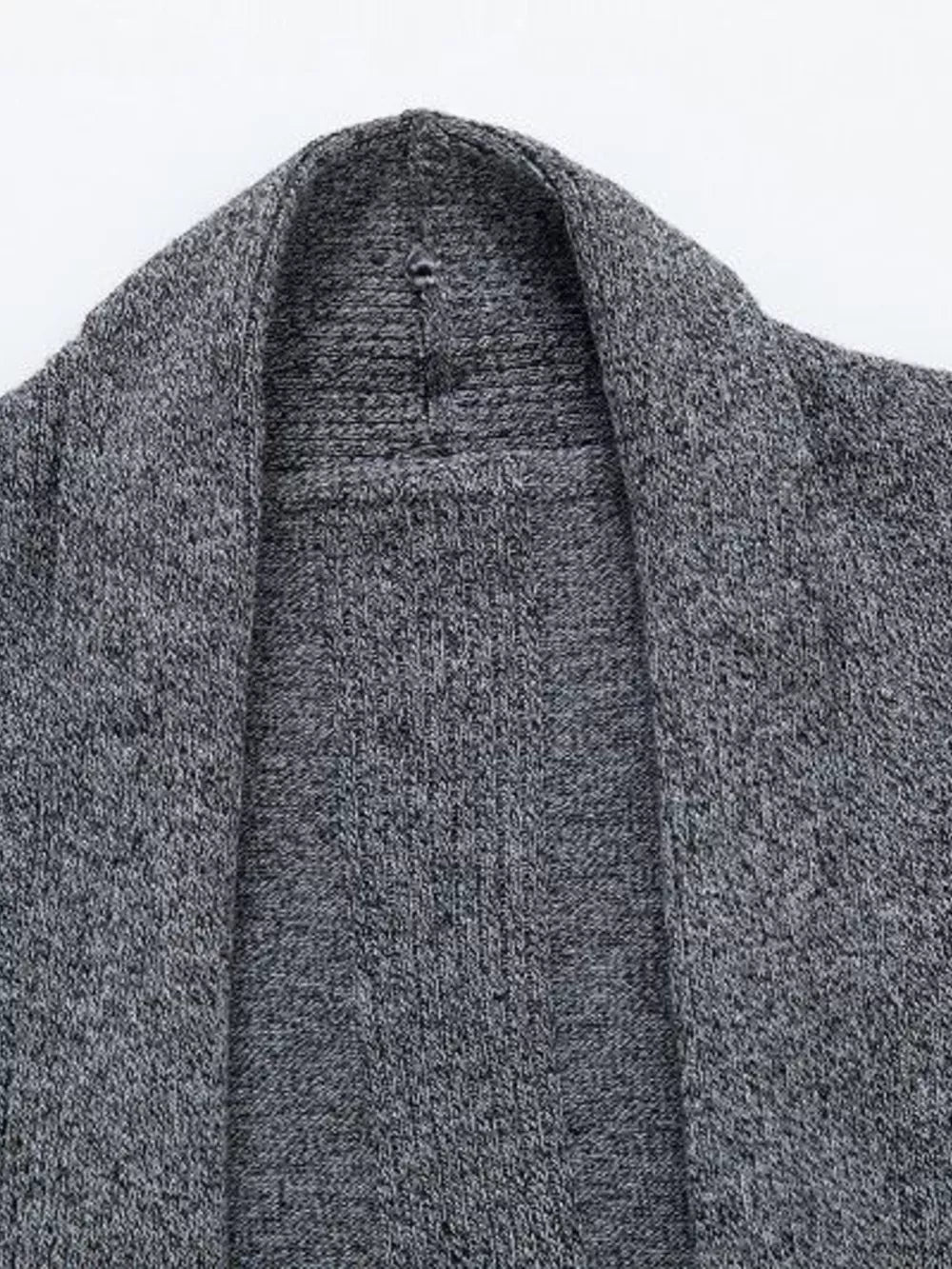 Gray heathered longline cardigan with shawl collar and ribbed knit texture.
