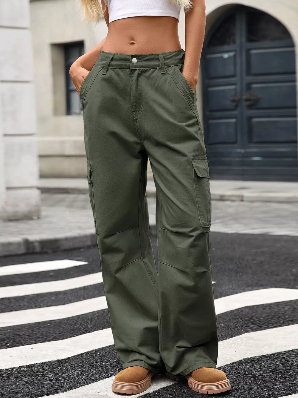 Army green high-waisted cargo jeans with multiple pockets and a relaxed fit.