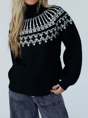 Black acrylic turtleneck sweater with white Fair Isle pattern and puff sleeves