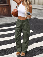 Army green high-waisted cargo jeans with multiple pockets and a relaxed fit.