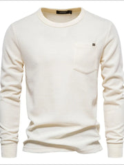 Ivory textured thermal long sleeve tee with chest pocket and minimalist detail.