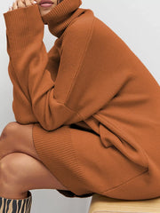 Caramel drop shoulder turtleneck sweater dress with ribbed cuffs and hem.