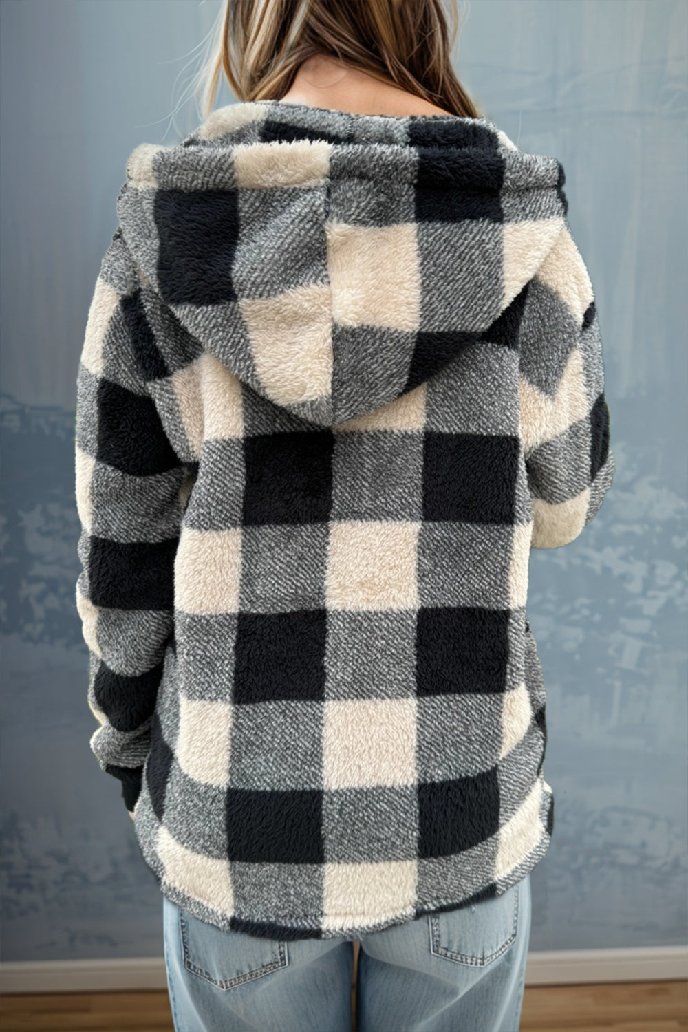 Sherpa zip-up jacket with black and cream buffalo check pattern and hood.