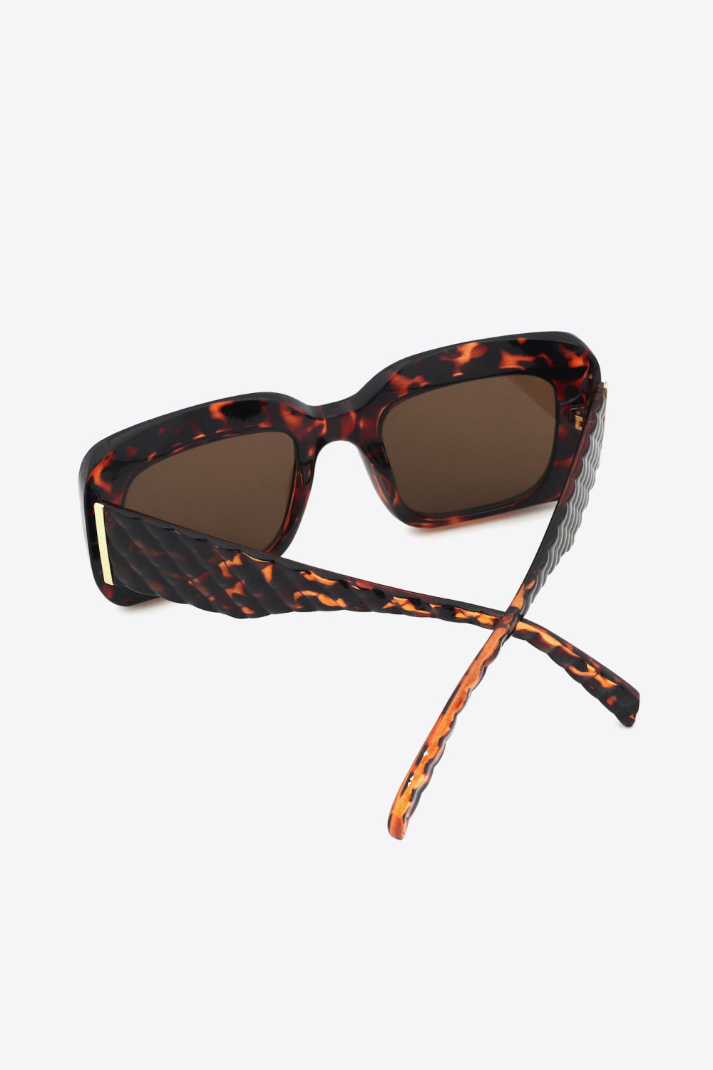 Tortoiseshell rectangular sunglasses with textured arms and brown lenses.
