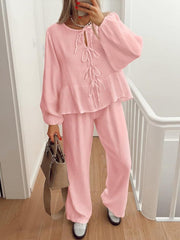 Dusty Pink Textured Peplum Tie-Neck Co-Ord Set with balloon sleeves and wide-leg pants.