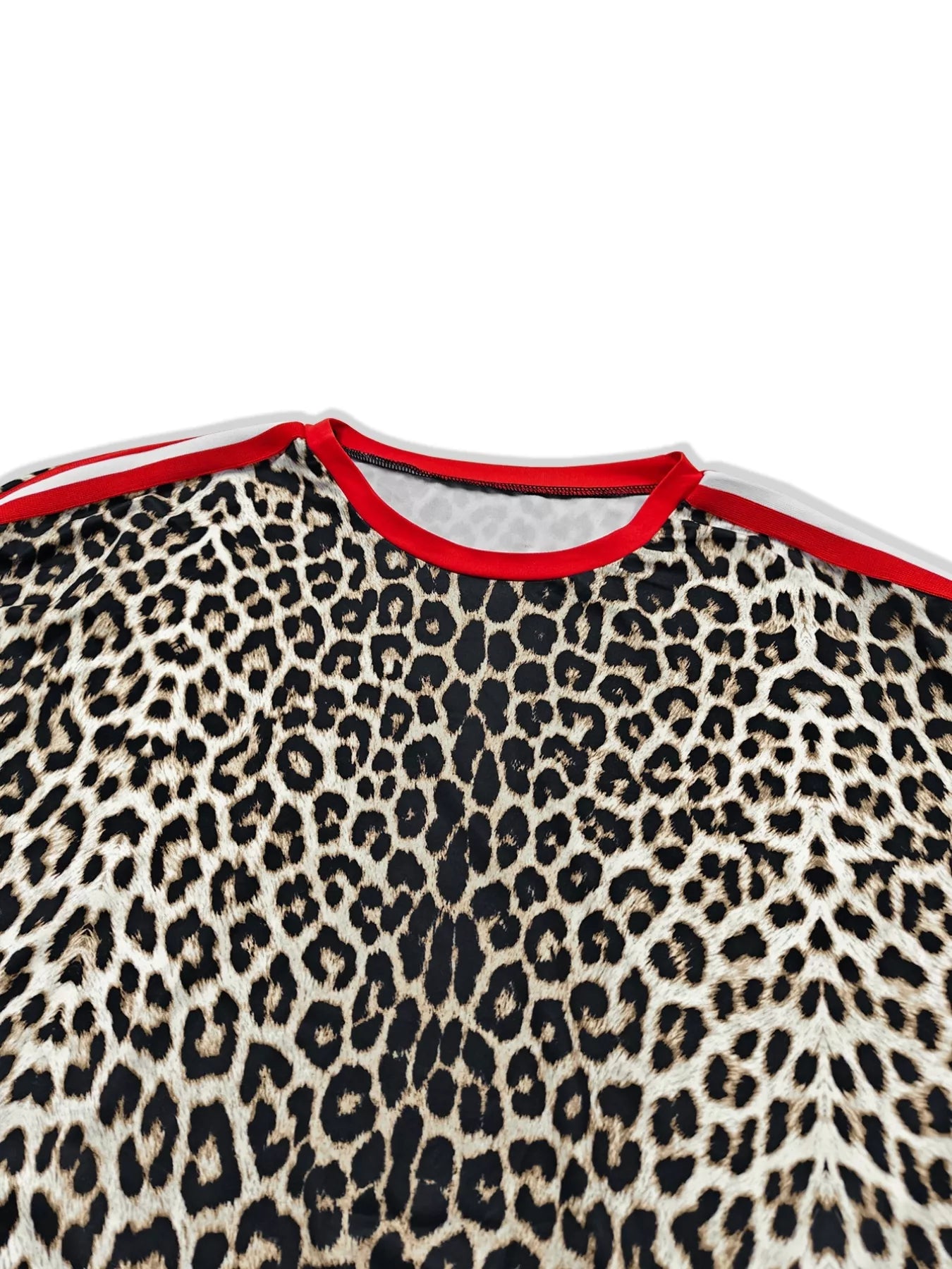 Leopard print loungewear top with red trim neckline and stripe detail on shoulders.