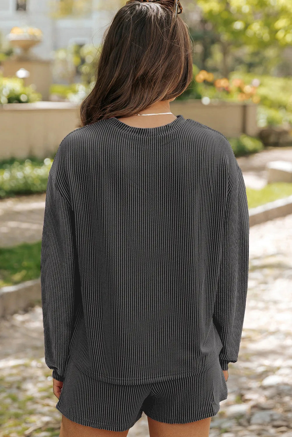 Black ribbed knit matching set with crew neck top and shorts