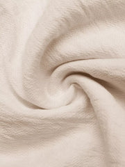 Boyshorts in apricot with textured fabric and shell trim detail.