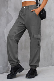 Dark gray utility cargo trousers with elasticated cuffs and multiple pockets.