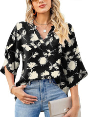 Flutter sleeve floral blouse with V-neck in black and cream polyester.