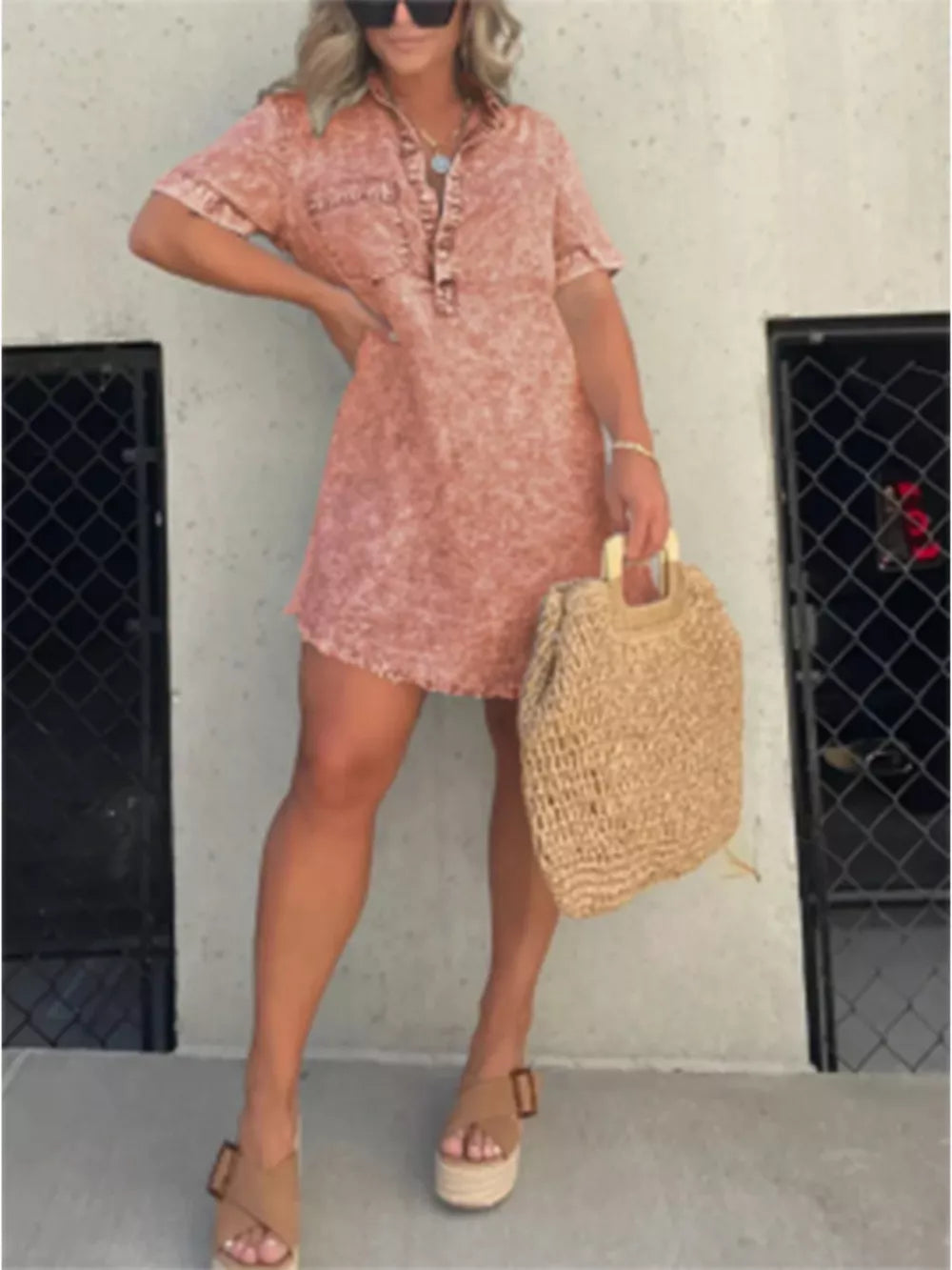 Coral short sleeve collared dress with button front and pockets, above knee length