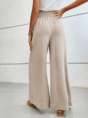 Textured palazzo lounge trousers in Dust Storm with a smocked waistband and wide legs.
