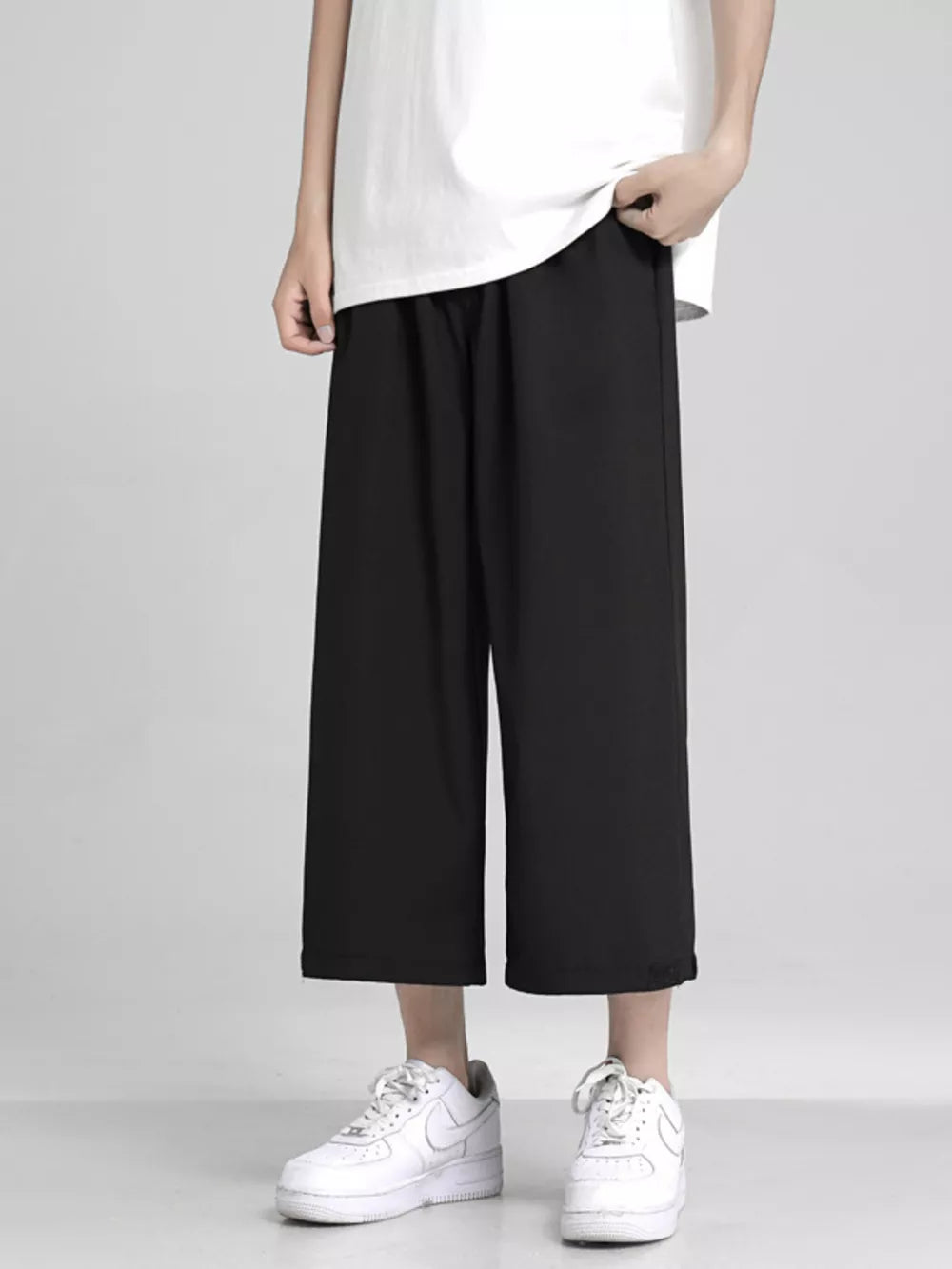 Men's Full Size Loose Fit Cropped Pants in White, close-up detail