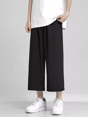 Men's Full Size Loose Fit Cropped Pants in White, close-up detail