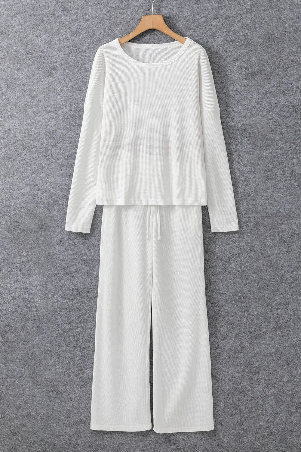 White ribbed lounge set with crewneck top and drawstring pants