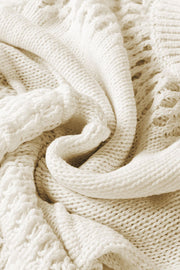 Ivory openwork knit pullover with balloon sleeves and textured stitch detail