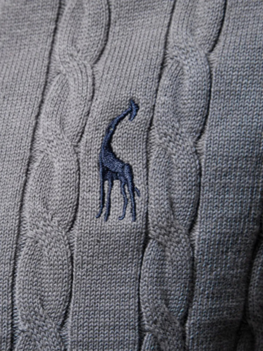 Gray cable knit crewneck sweater with embroidered giraffe detail