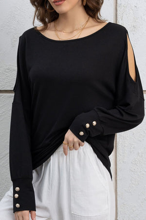 Black shoulder-slit top with button cuffs and a boat neckline.