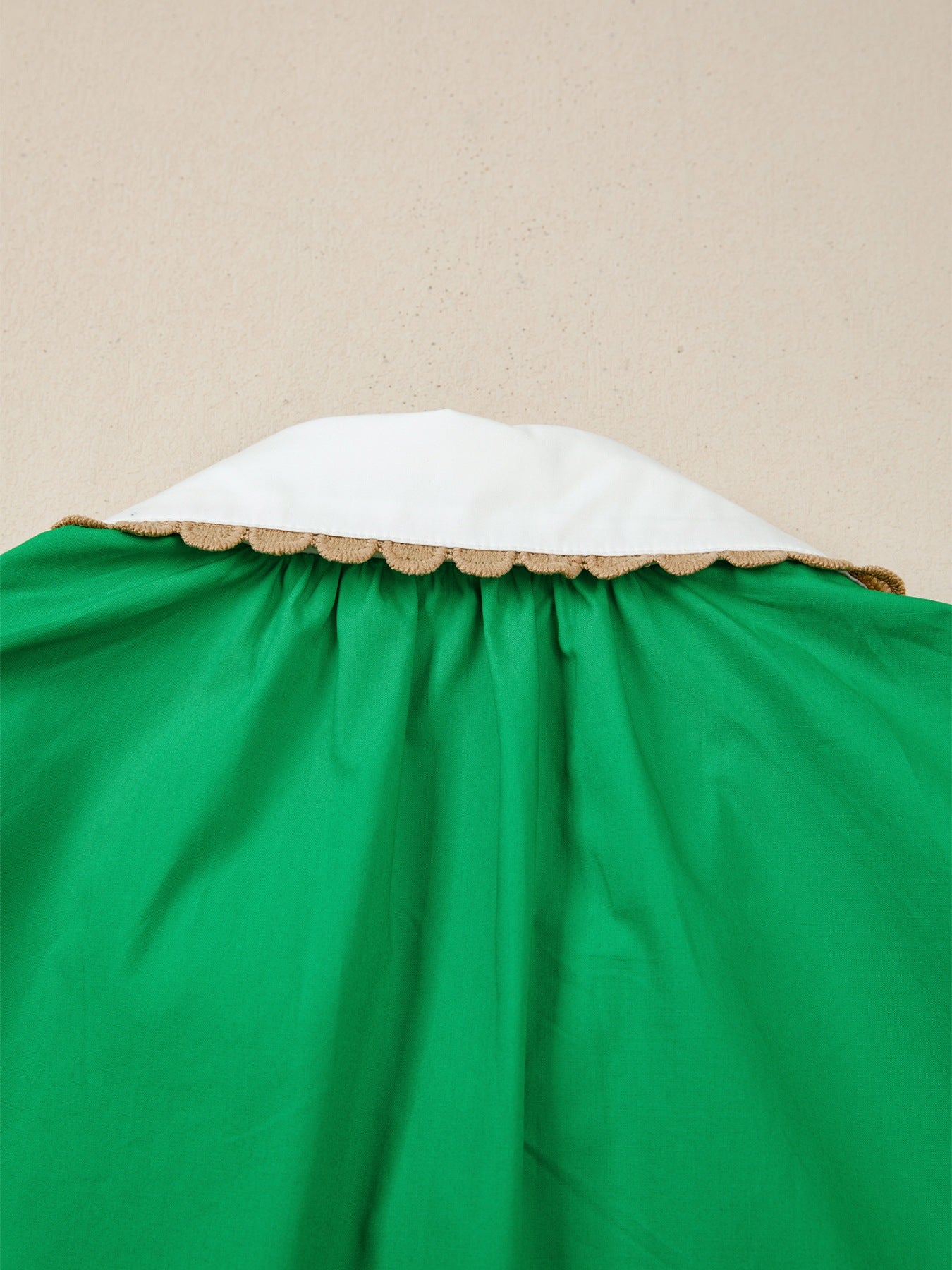 Green cotton blouse with white collar and ricrac trim detail