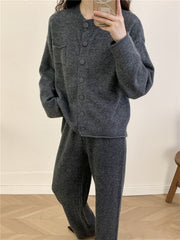 Dark gray ribbed knit cardigan and wide leg pants set with button front and chest pocket.