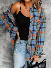 Oversized plaid shacket in blue with orange and black accents, relaxed fit, button front, and chest pocket.