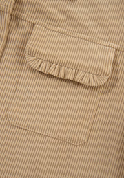 Tan corduroy utility shirt with ruffled pocket detail.