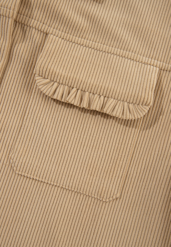 Tan corduroy utility shirt with ruffled pocket detail.