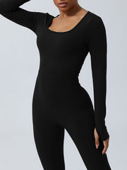 Black long sleeve sculpting jumpsuit with scoop neck and thumbhole cuffs