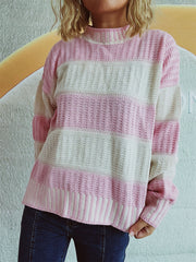 Textured stripe mock neck knit sweater in blush pink and cream with a relaxed fit.