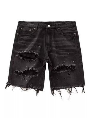 Black distressed denim shorts for men with paint splatters and frayed hem.