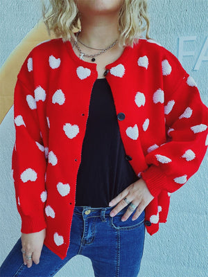 Deep Red acrylic button-down cardigan with white textured heart motif, crew neck, and ribbed cuffs.