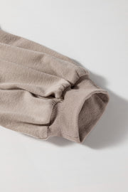 Raglan puff sleeve sweatshirt in mocha, showing gathered sleeve detail and ribbed cuff.