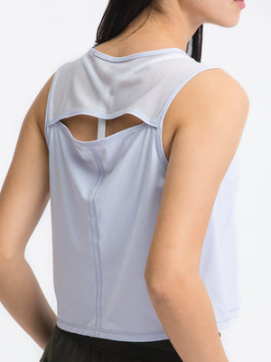 Light blue cropped active tank with mesh back detail and cutout