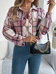Cropped plaid shacket in dusty pink with gathered sleeves and buttoned pockets.
