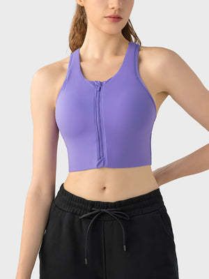 Purple zip-front racerback sports bra with a cropped fit.