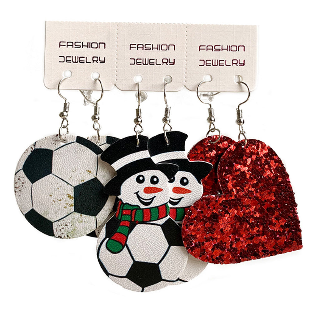 Festive sports trio earrings set with soccer ball, snowmen, and red glitter hearts.