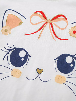 White cotton baby tee with a cute cat face, pink and red bow, and floral details.