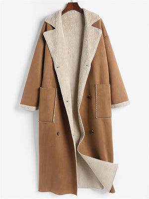 Brown reversible maxi coat with shearling trim and double-breasted closure.