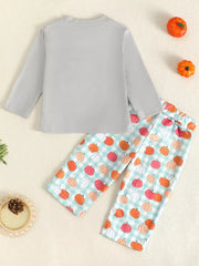 Baby girl's long sleeve top and pants set with pumpkin print on gingham pants.