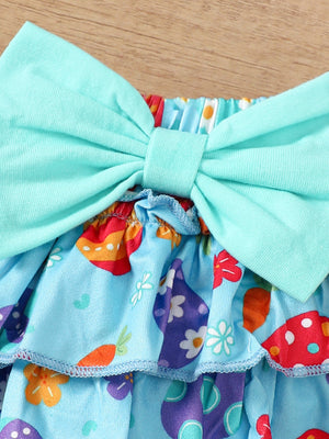 Baby girl's cotton bodysuit and skirt set with Easter carrot print and bow detail.