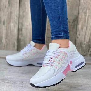 White and pink lace-up chunky platform sneakers with a casual style.