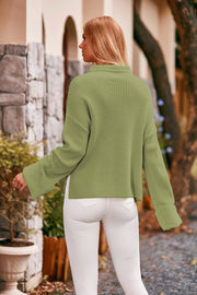 Matcha green acrylic turtleneck sweater with cuffed sleeves and a relaxed fit.