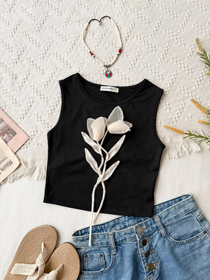 Black floral embellished round neck crop tank top with applique detail.